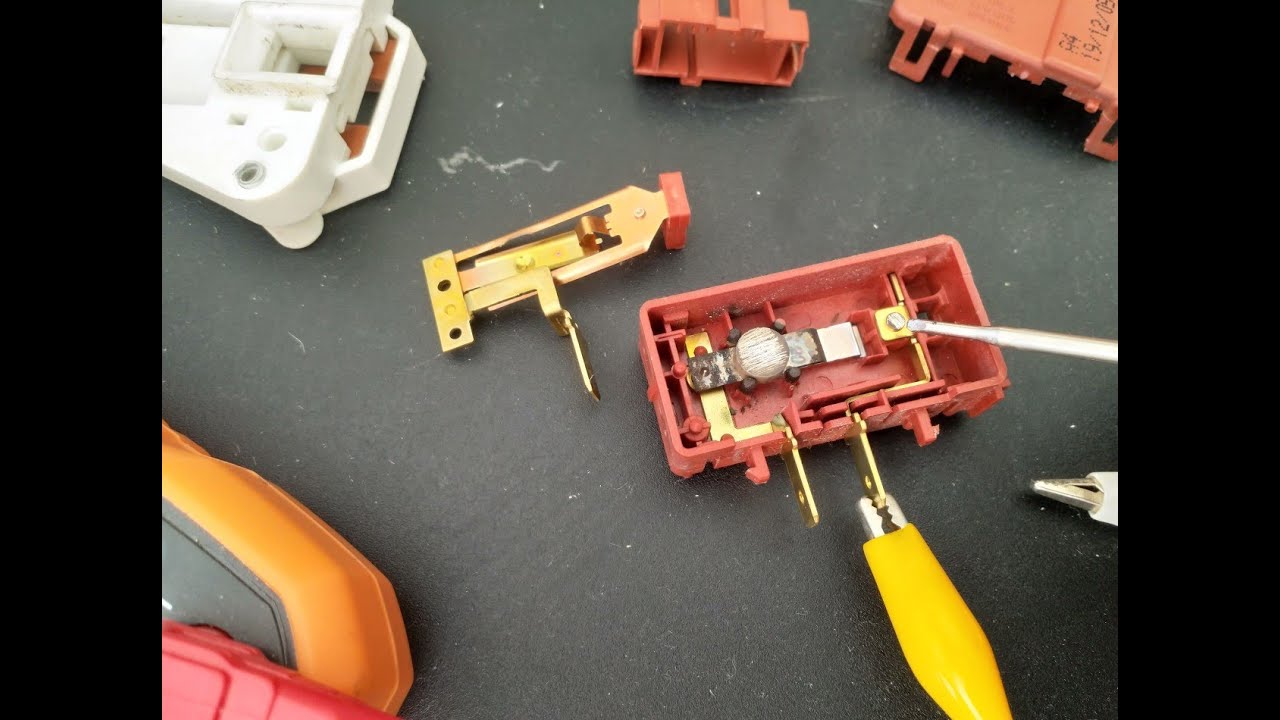 Réparation d'un problème au niveau de la sécurité de porte d'une machine à laver