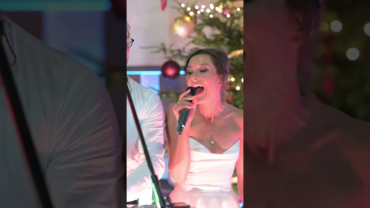 the bride who is a professional wedding singer, was debating whether to sing or not to sing