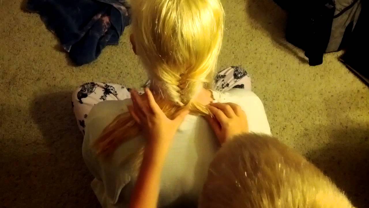 Boo fishtail braiding mom's hair.