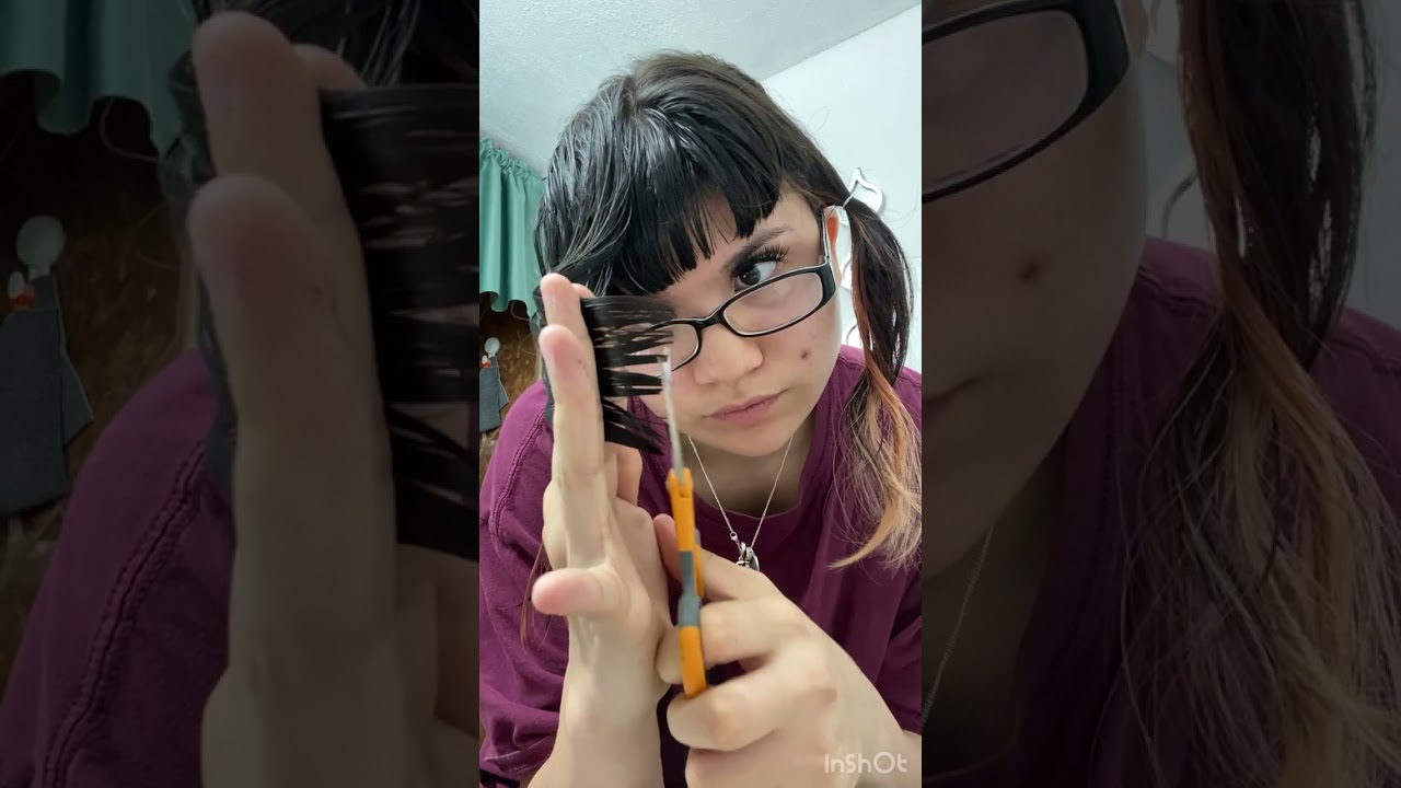 Cutting my hair following a @BradMondo wolfcut tutorial! (Pls don’t come after me for the scissors)￼