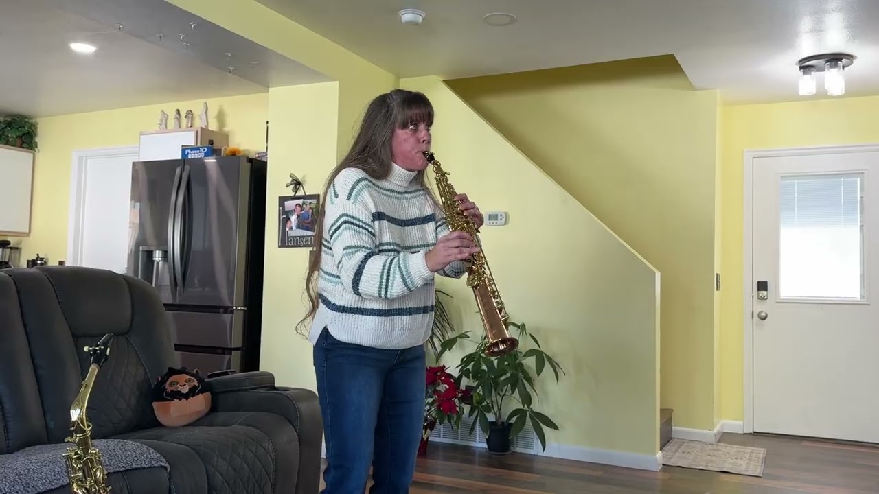 Missy playing Through the Years on new soprano saxophone.