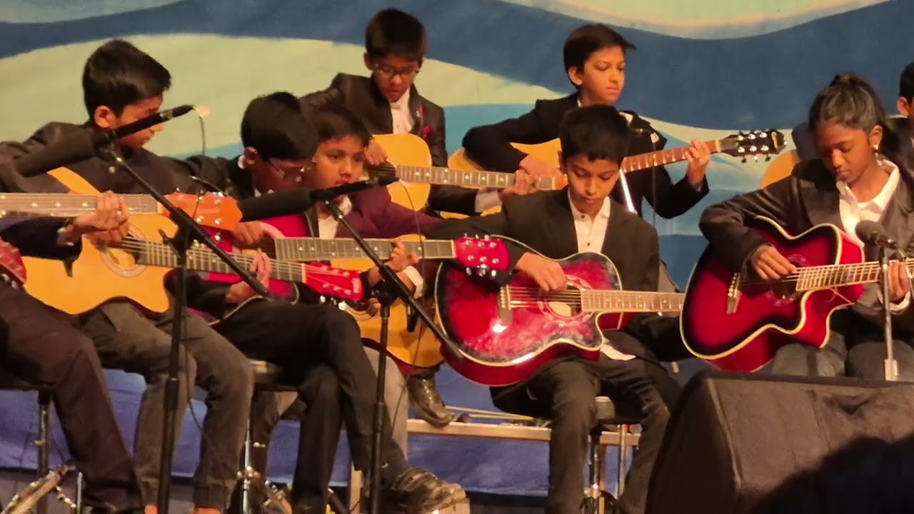 Siddhant's first  guitar performance on stage grade 6