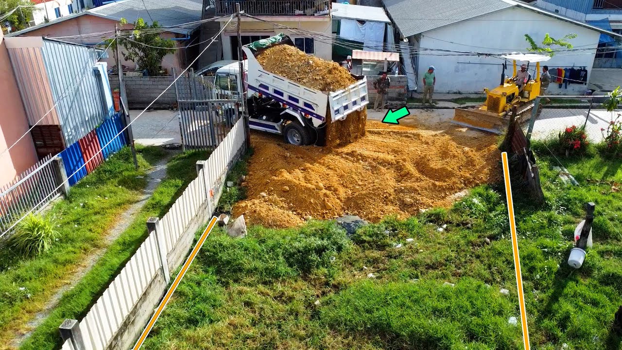 New Project!!! Dozer & Dump Truck Starting To Pour Soil​ On water and grass To Build a House​. Nice!