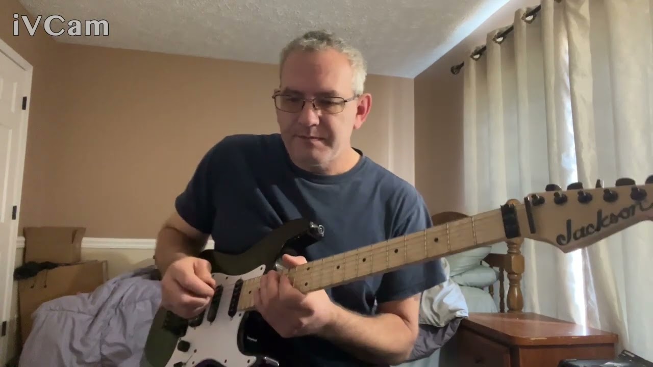 picking a guitar