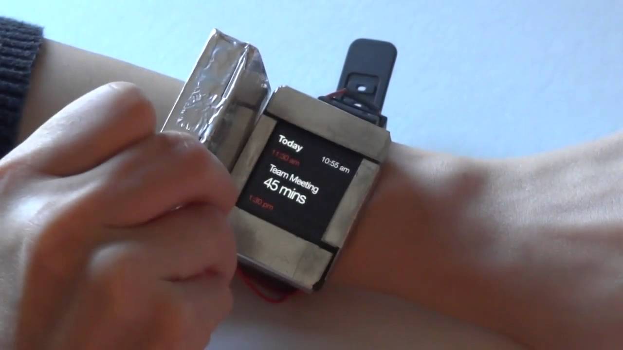 Doppio: A Reconfigurable Dual-Face Smartwatch for Tangible Interaction
