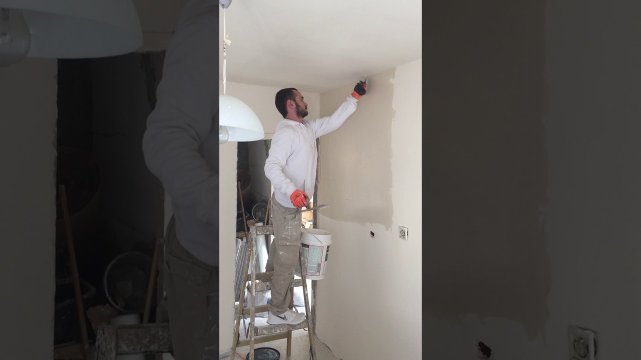 החלקת קירות בשפכטל אמריקאי בעזרת מליטש ע