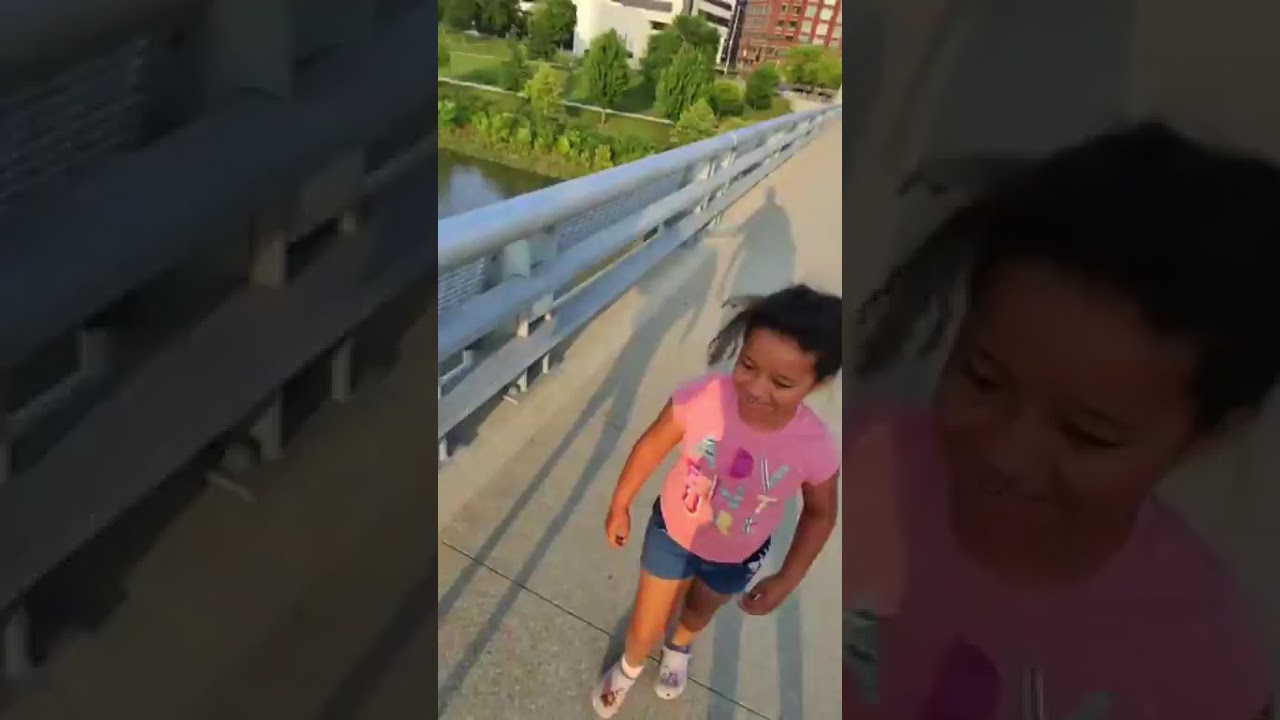 Hanging out with my8 yearold daughter downtown Columbus walking along the river with my meta glasses