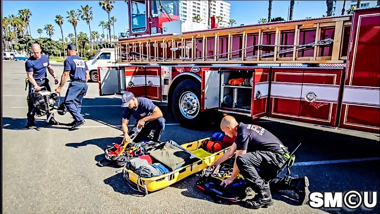 𝗙𝗜𝗥𝗘 𝗖𝗛𝗘𝗖𝗞𝗦: Santa Monica Firefighters Perform Gear Inspections, Greet Families Along Beachfront Lot