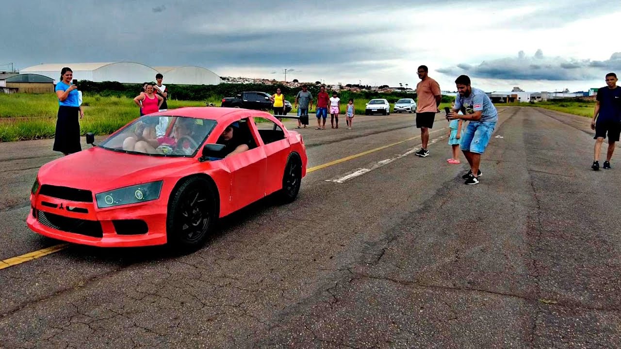 Andei e levei pessoas no Mini Lancer