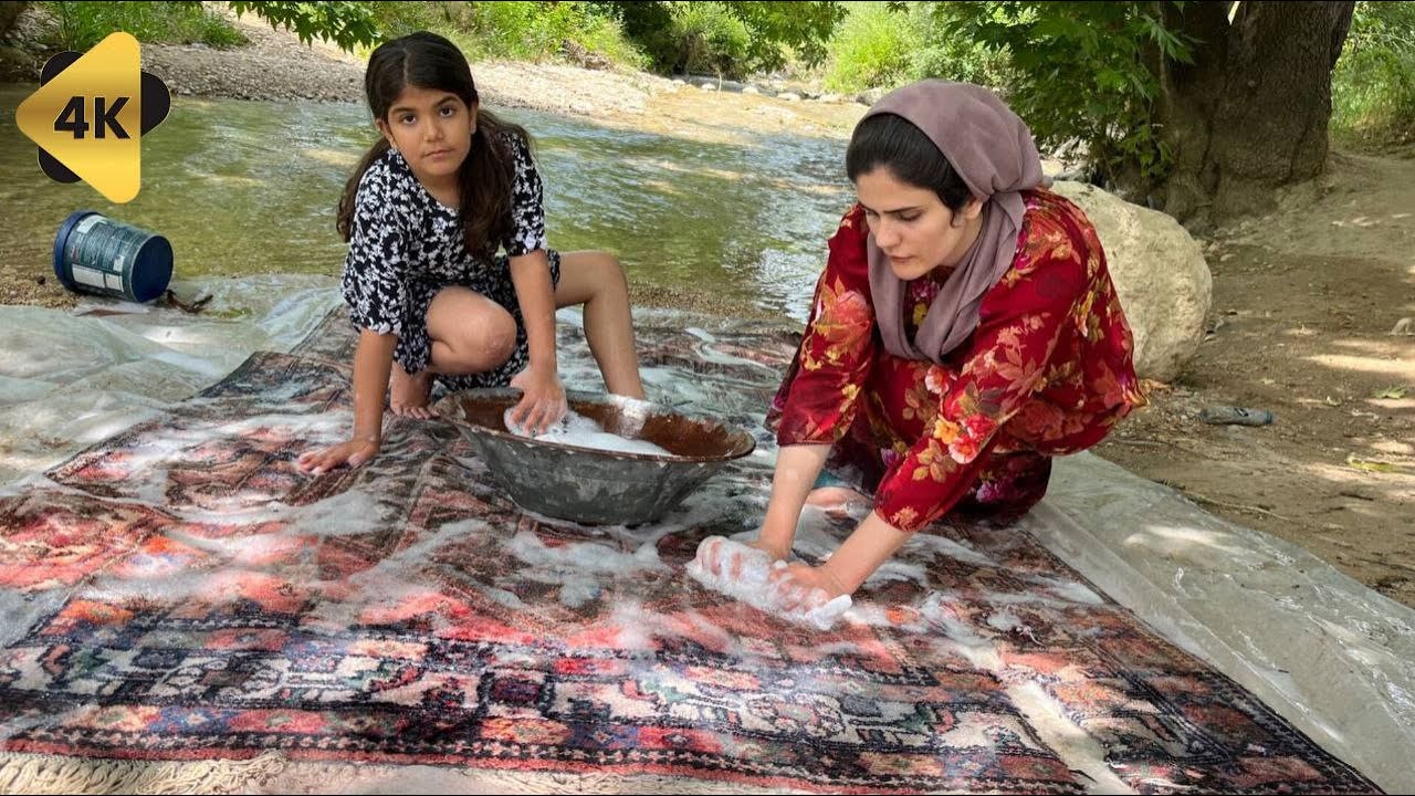 Rural and nomadic lifestyle 50 years ago:Attractive washing of traditional Iranian carpets/village