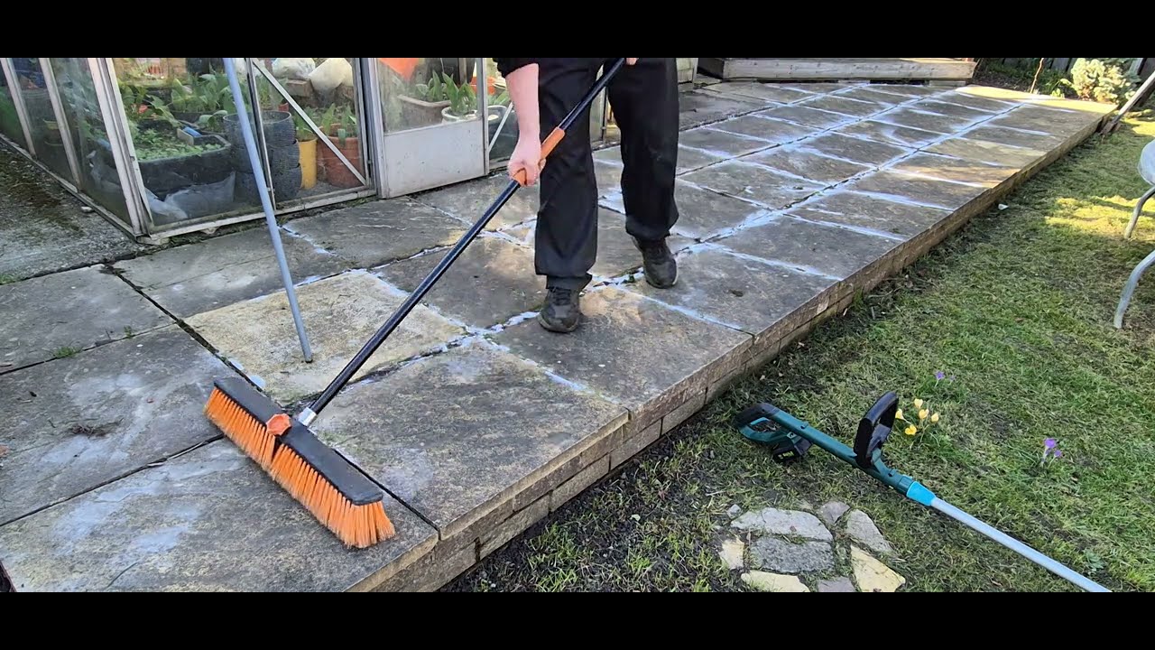Cleaning the patio then salting the weed to get rid of 💚 