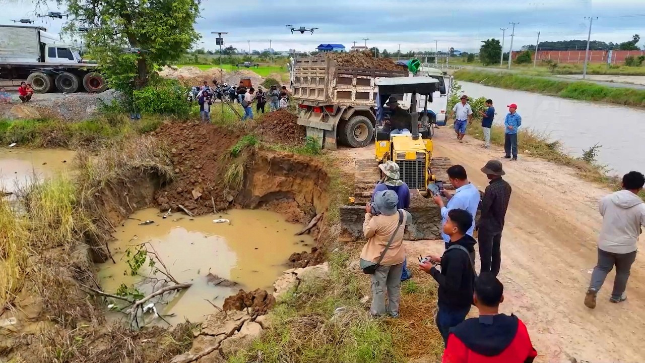 Great New project Using Heavy dump truck 5T unloading soil landfilling flooded with bulldozer D21P.