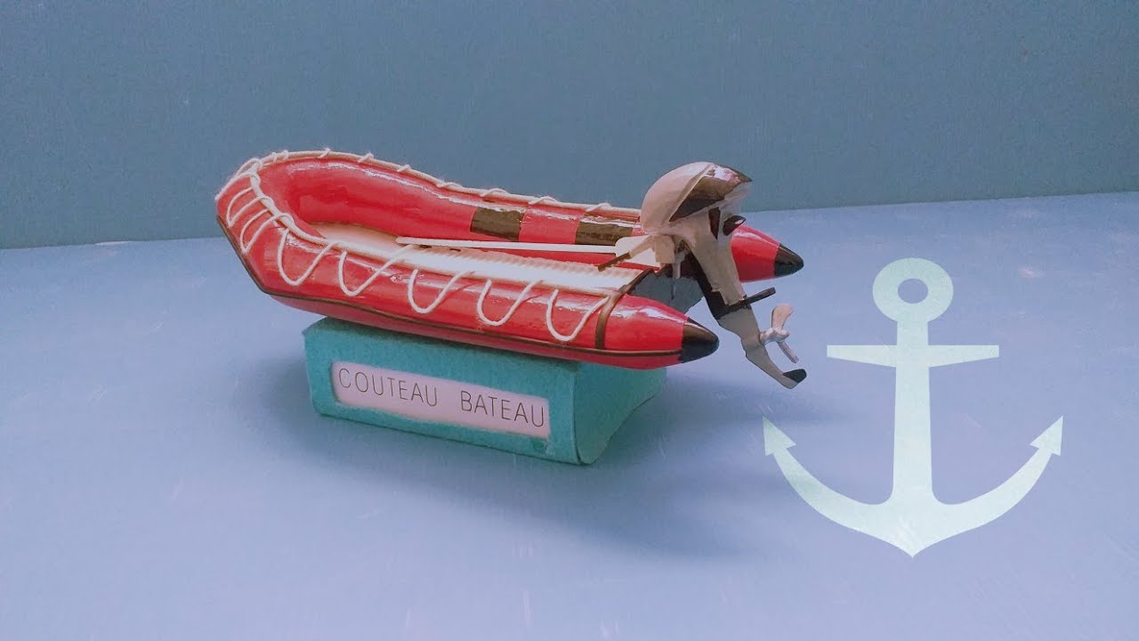 Maquette bateau pneumatique zodiac rouge  en bois .⚓