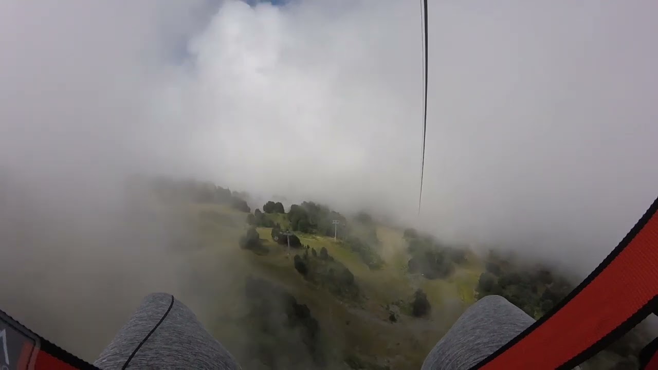 Tyrolienne géante Chamrousse sous la brume