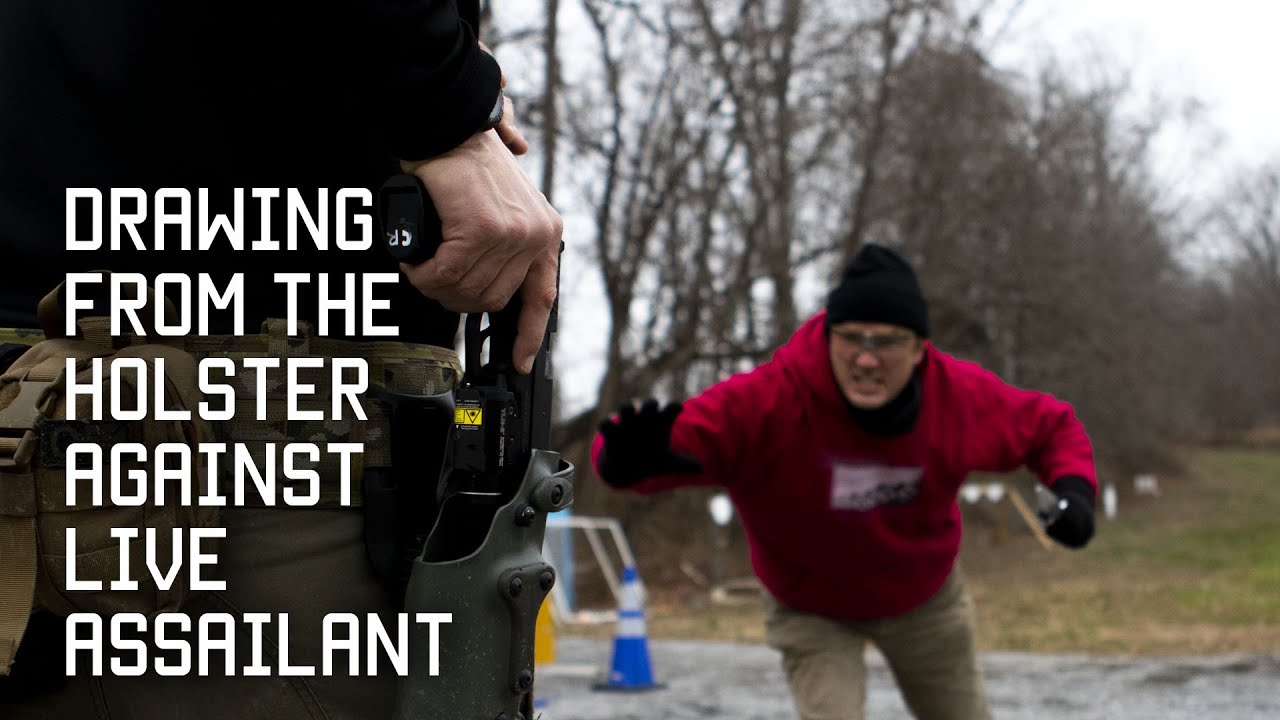 Drawing from the holster against live assailant | Tactical Rifleman