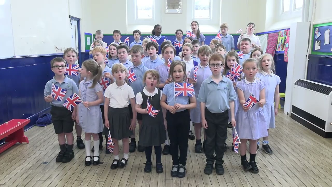 Spaxton children singing for VE Day 2025