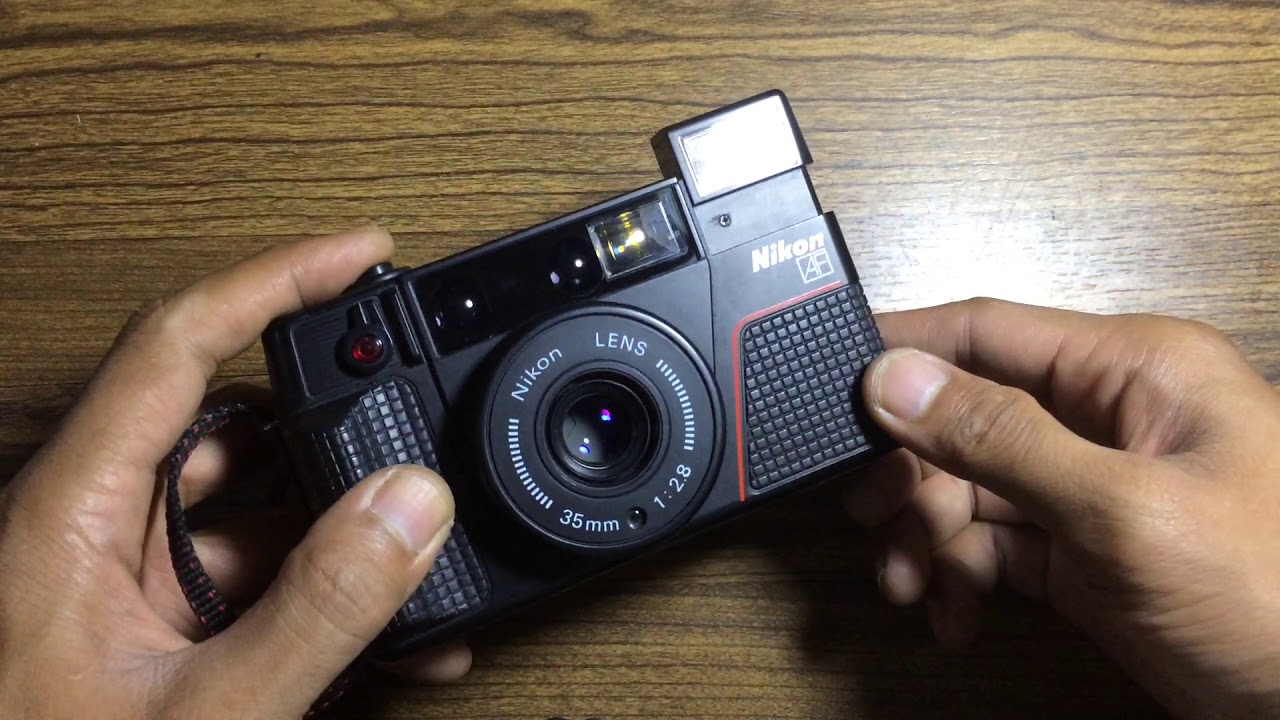 cara memasang roll film kamera analog Nikon L35AF2 / L35AD2