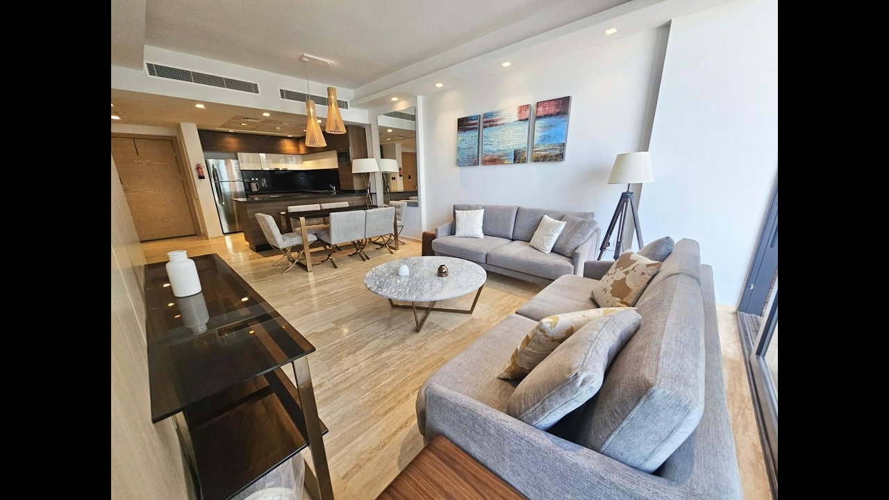 Thoughtfully appointed modern 2 bedroom + maid room apartment with scenic sea views !