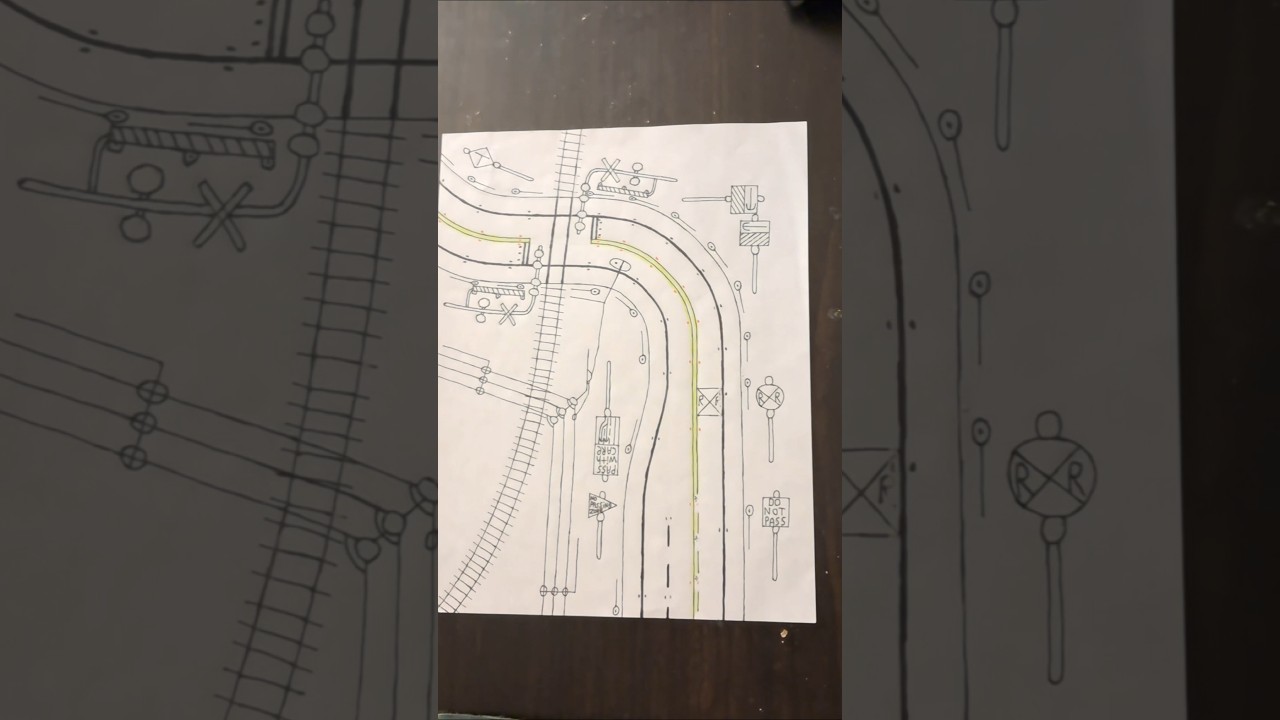 Weekend Road Art: Curve, then railroad crossing. 