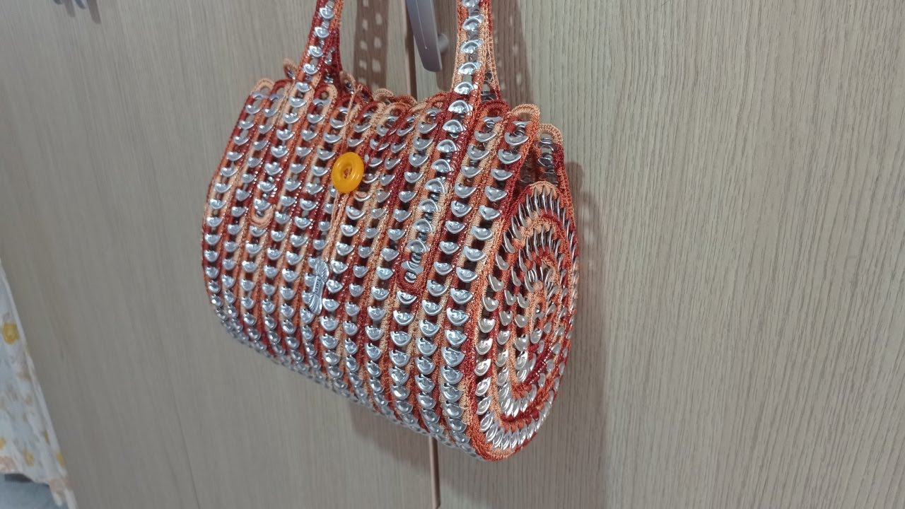 Como hacer bolso cilíndrico con anillas de lata