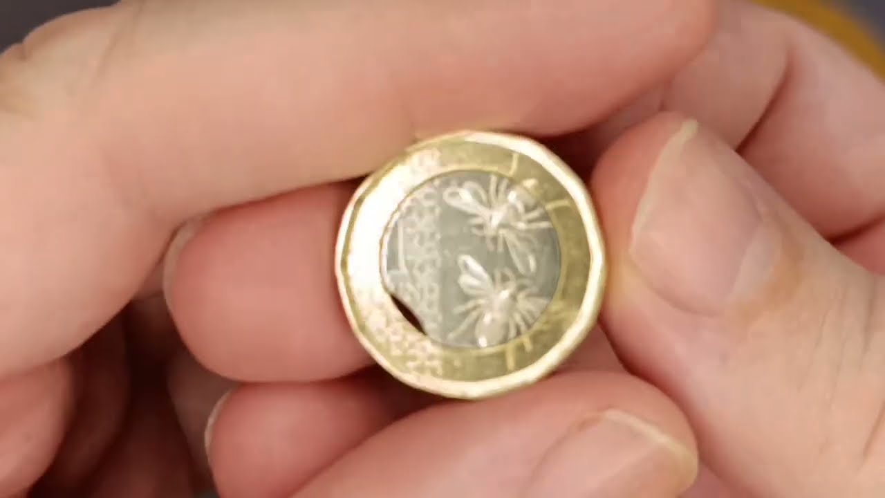 2023 UK Pound Coin with FAKE inner clip error