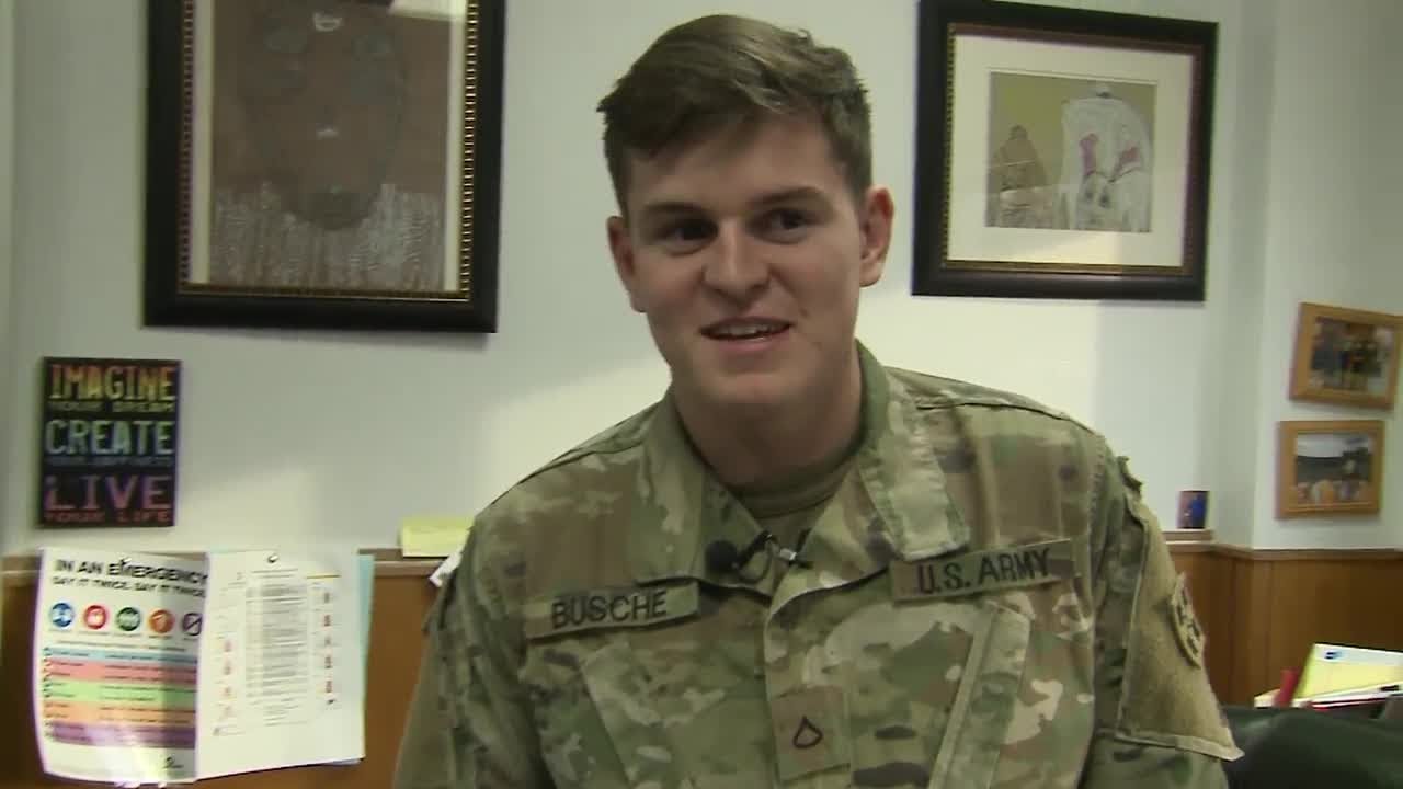 Soldier surprises younger brother at school assembly