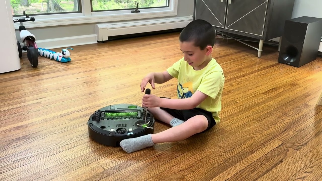 Lucas changes the brushes on his iRobot Roomba j7