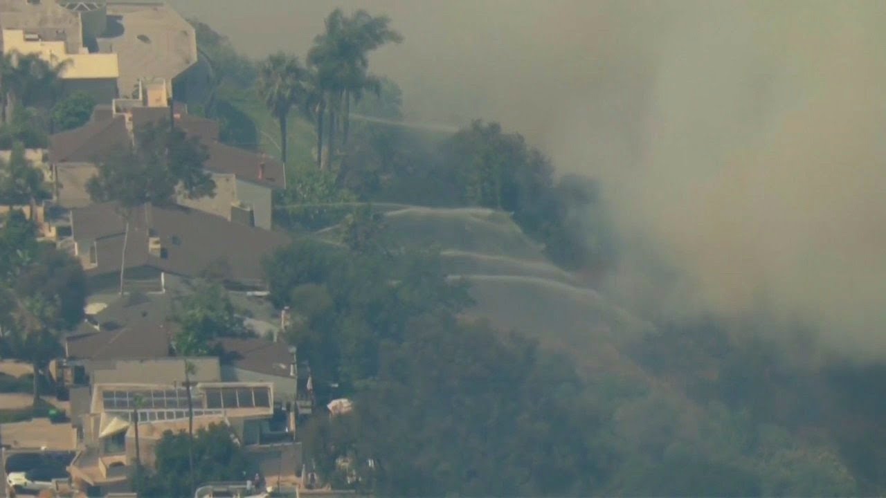 Residents, firefighters try to slow down Laguna Beach fire