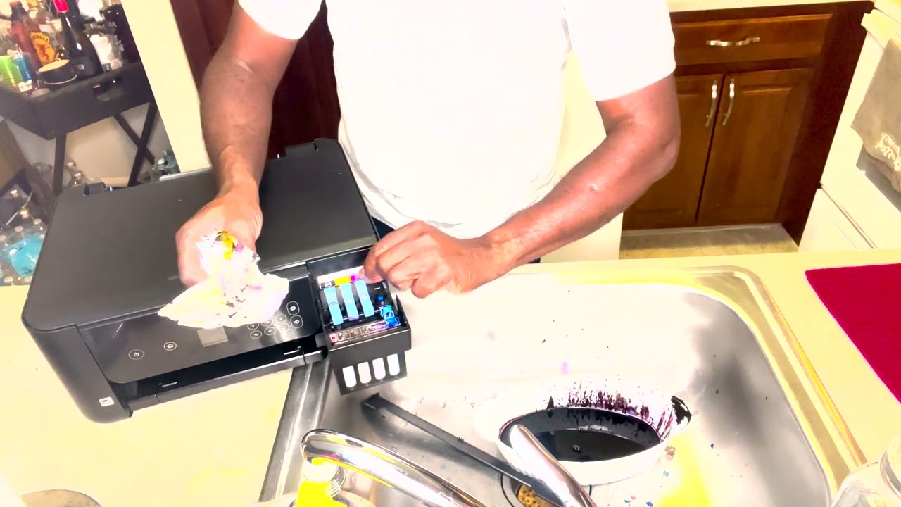 HOW TO REMOVE  PRINTER INK FROM YOUR EPSON 2800 PRINTER