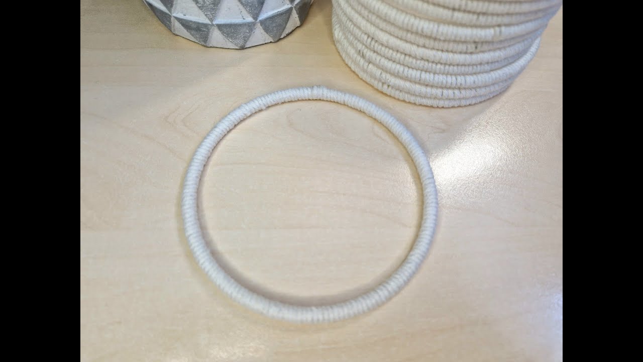 How to Wrap a Metal Ring With Macrame Rope