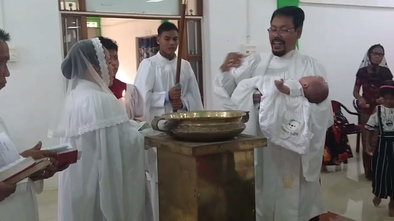 Christening of Zane Isaac, celebrated with joy, prayers, and love.”_