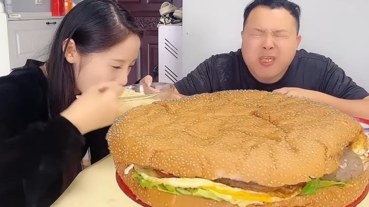 My stupid husband won't let me eat a big burger  so I'll give him some mustard.