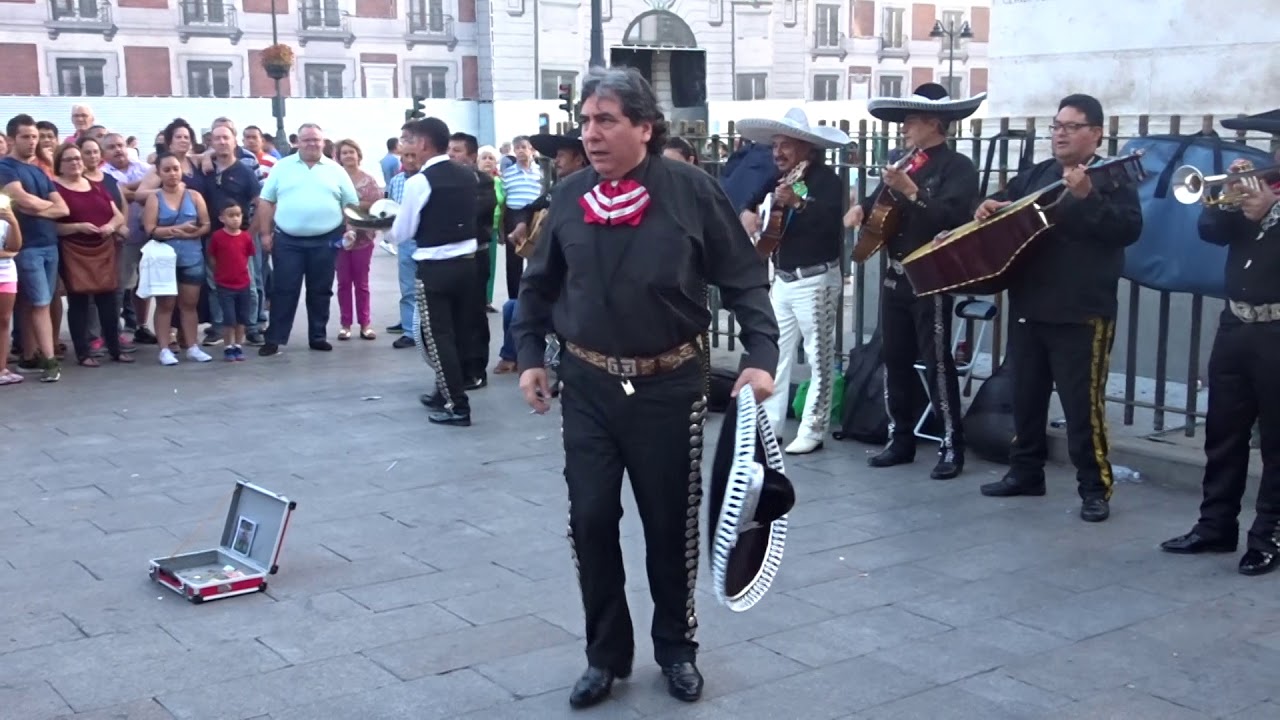 Mariachi band and lively dancer in Puerto del Sol, Madrid
