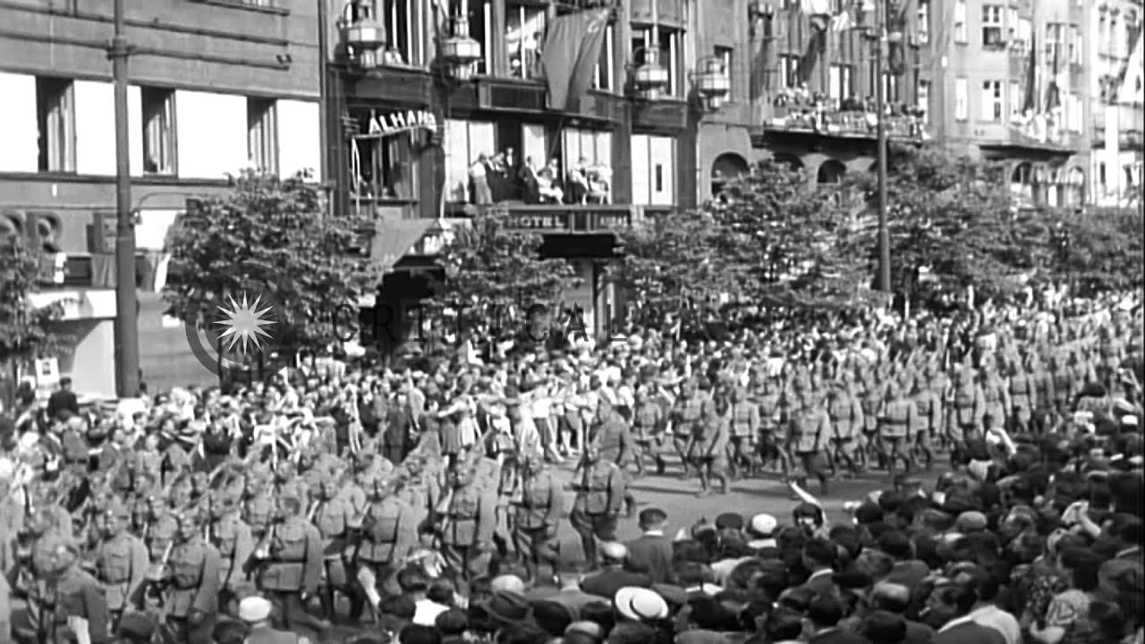Czech soldiers parade along streets and cheering crowds watch parade in Prague, C...HD Stock Footage