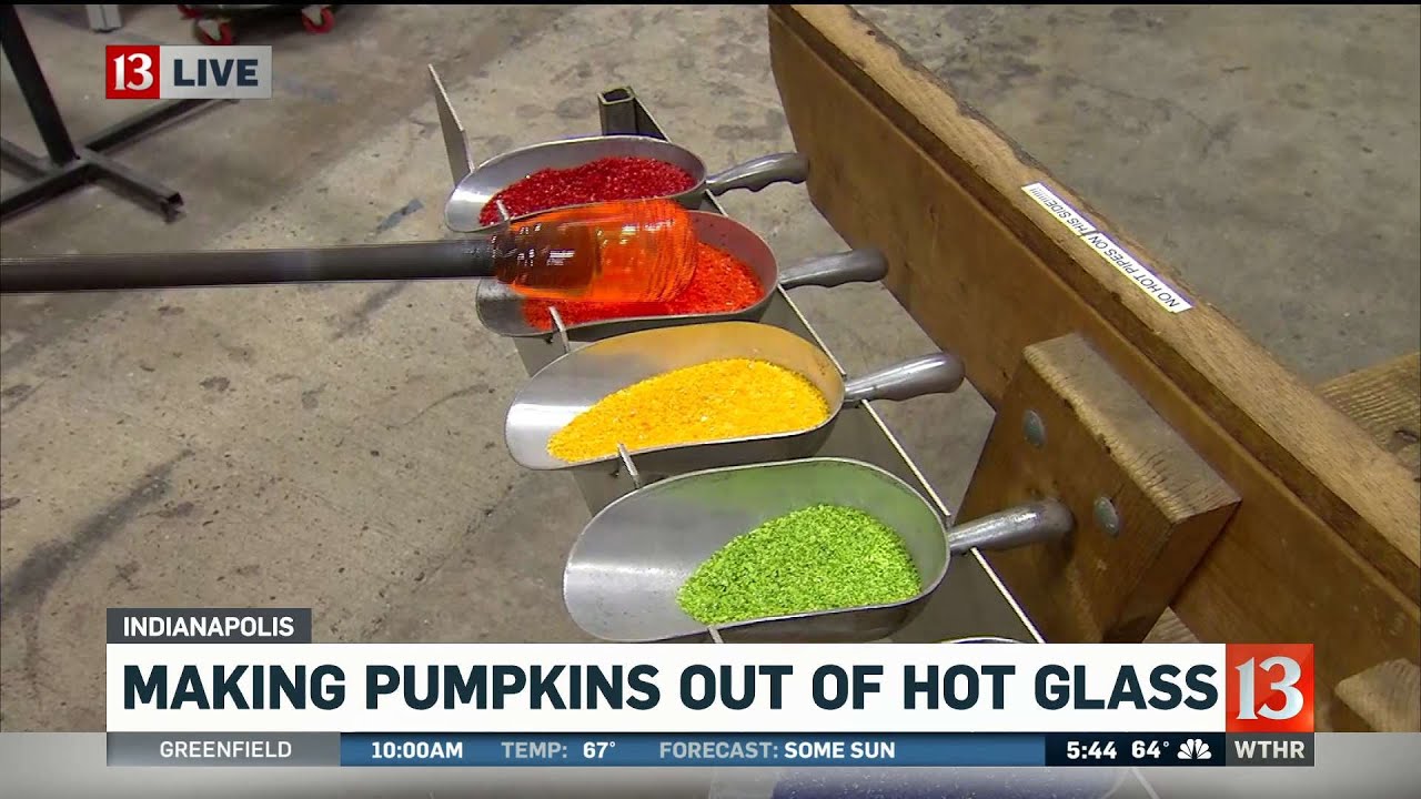 Making pumpkins out of hot glass