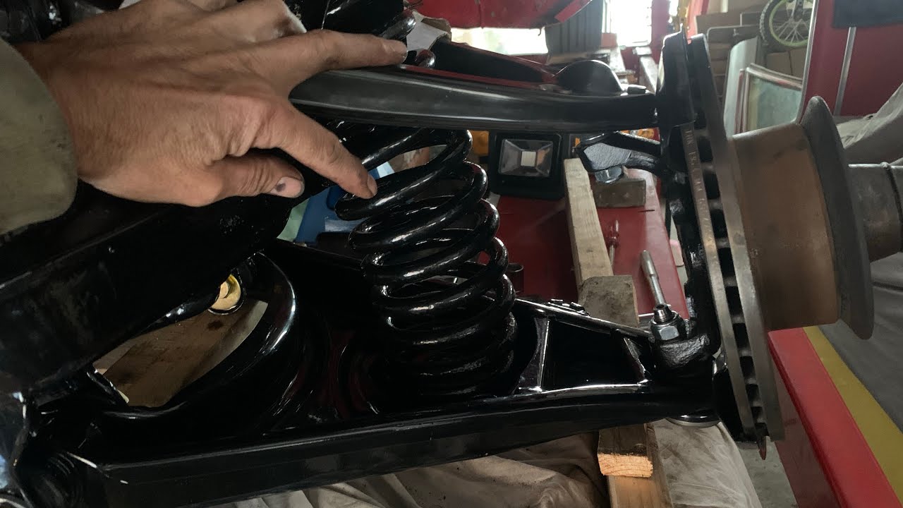 Mercedes 107 SL spring installation with coil spring compressor