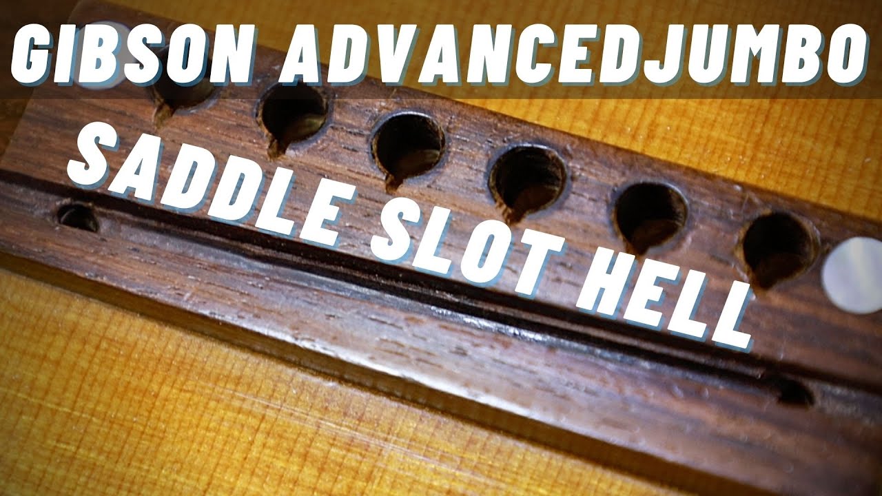 Gibson Advanced Jumbo with a strange bundle of saddle slot problems