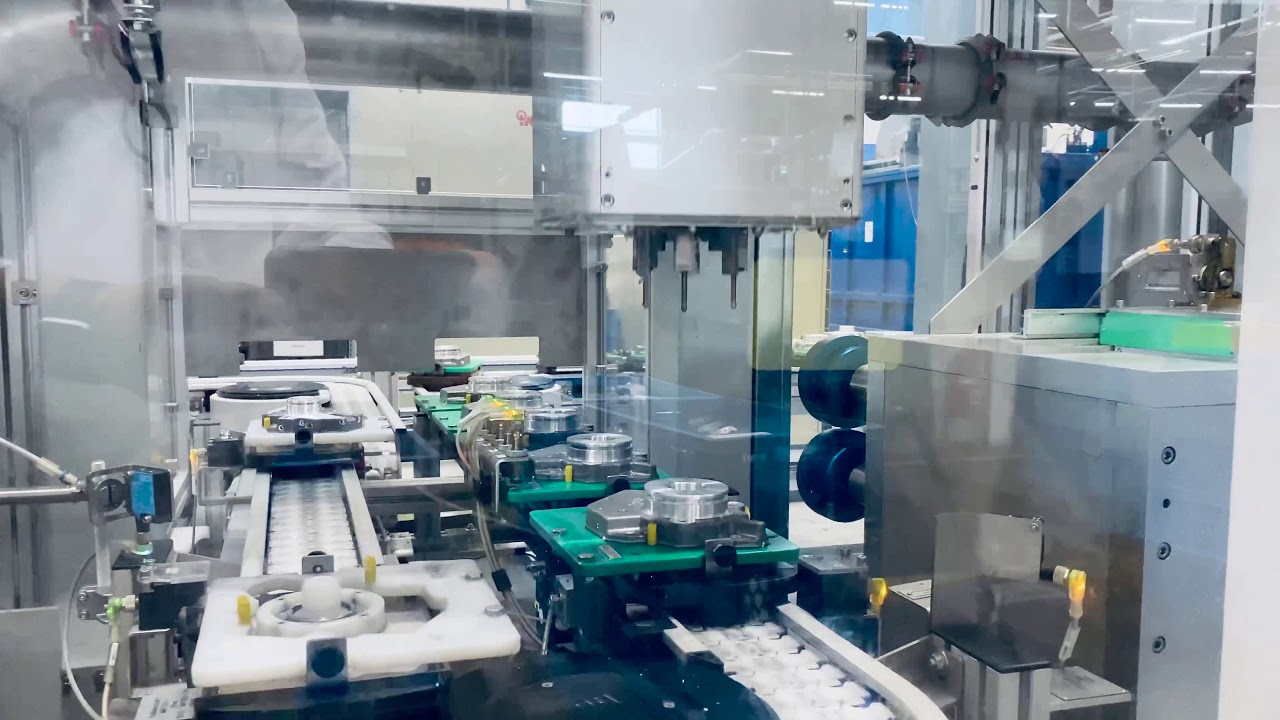 Automatische Bestückung der Waschkammer