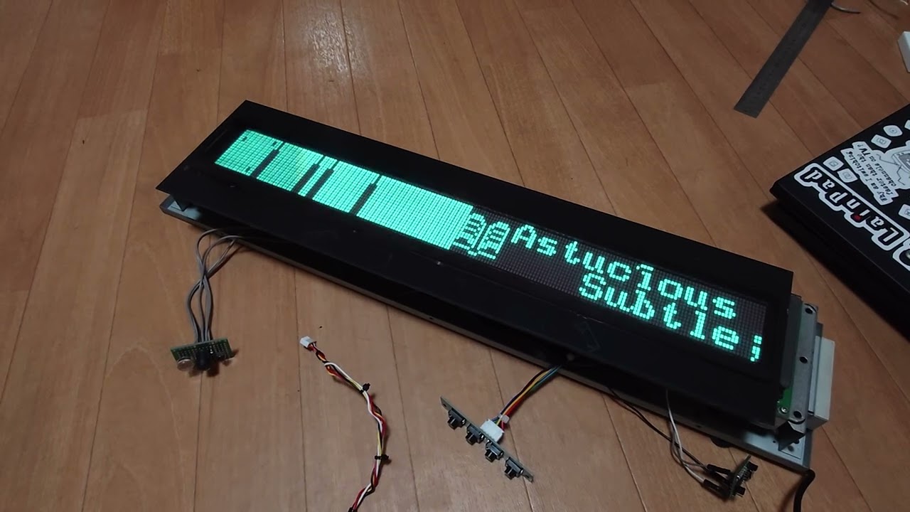 LongPIS-OS test on half meter long Noritake ITRON GU192X16-312 VFD with split screen multitasking