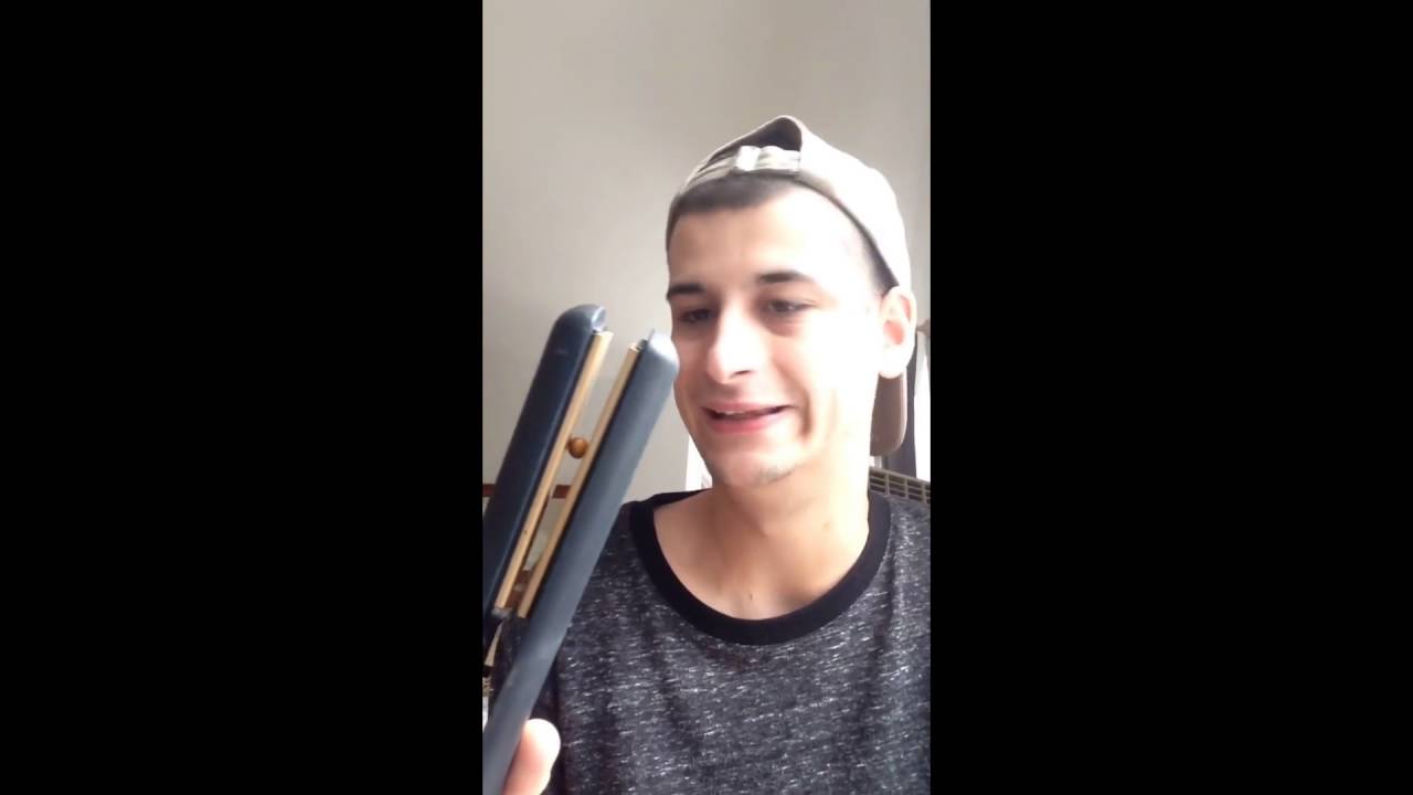 Boy makes the popcorn with the hair straightener