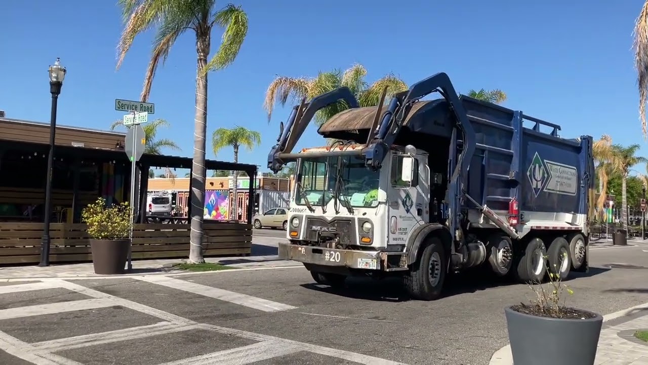 Dade City: Waste Connections Mack MRU Hercules EZpack FEL