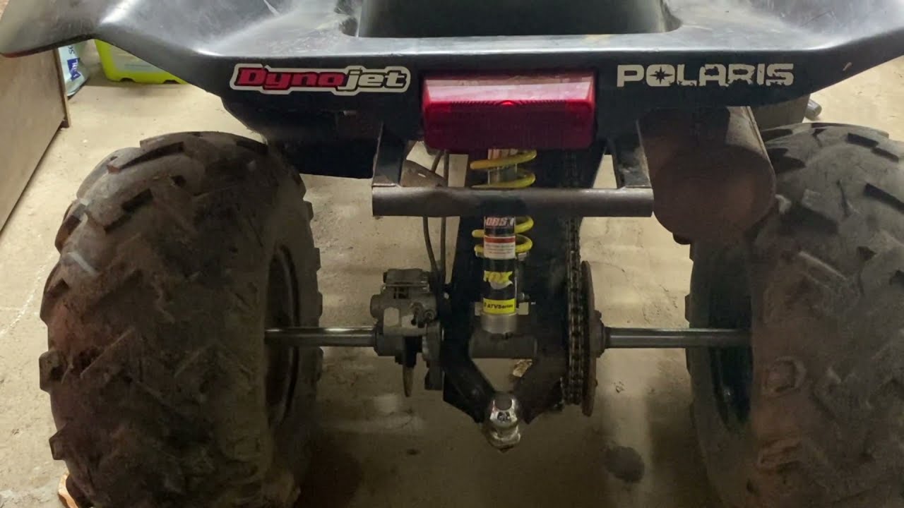How to reassemble a Polaris Scrambler 500 swing arm.