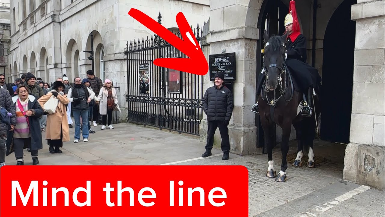 “Step Back!” Guard Corrects Boy Near the White Line 