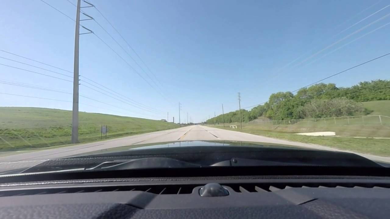 2011 Mustang GT with QTP cutouts and stock exhaust