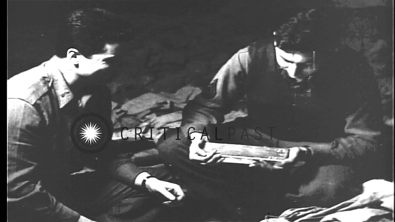 US soldiers examine gold bars and Reichsbank notes inside Merkers Mines in German...HD Stock Footage