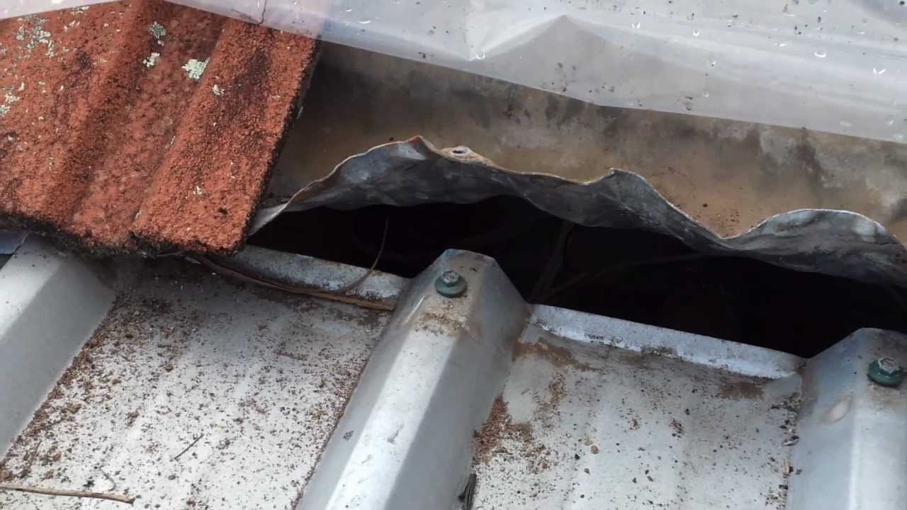 Sydney roofing repairs, leaking joint between tile and metal roof
