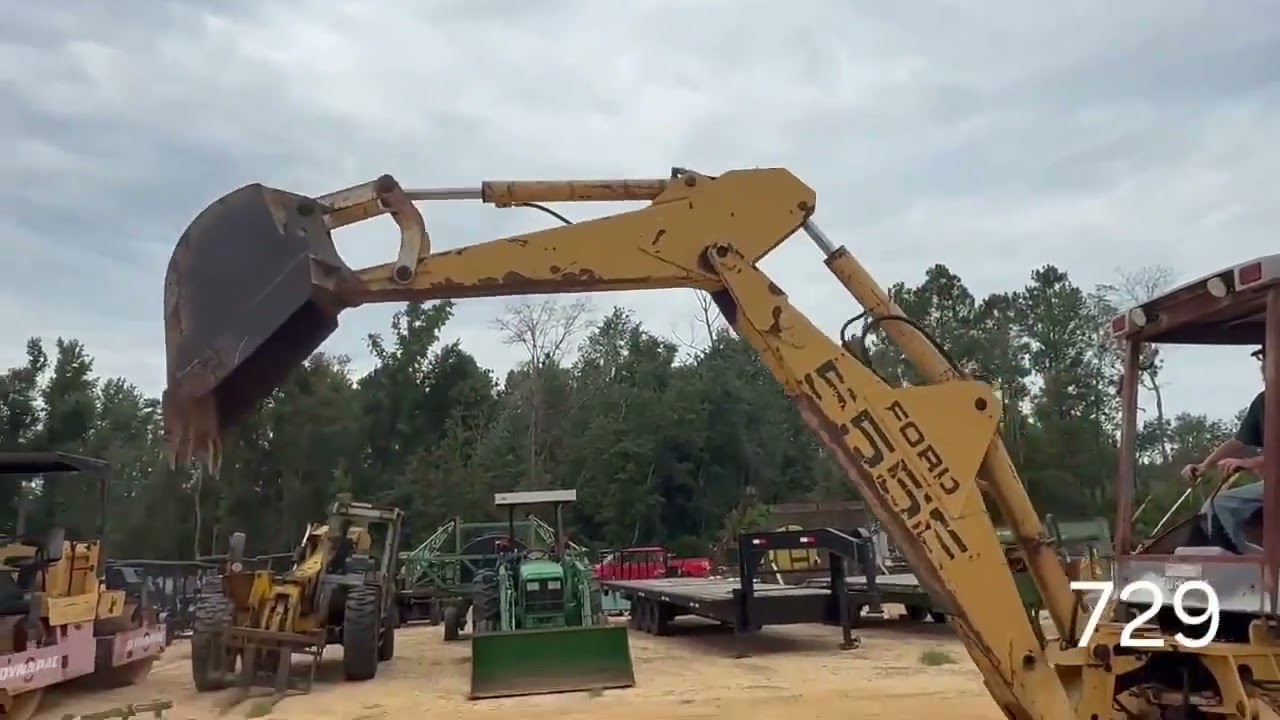 NEW HOLLAND 555E For Sale