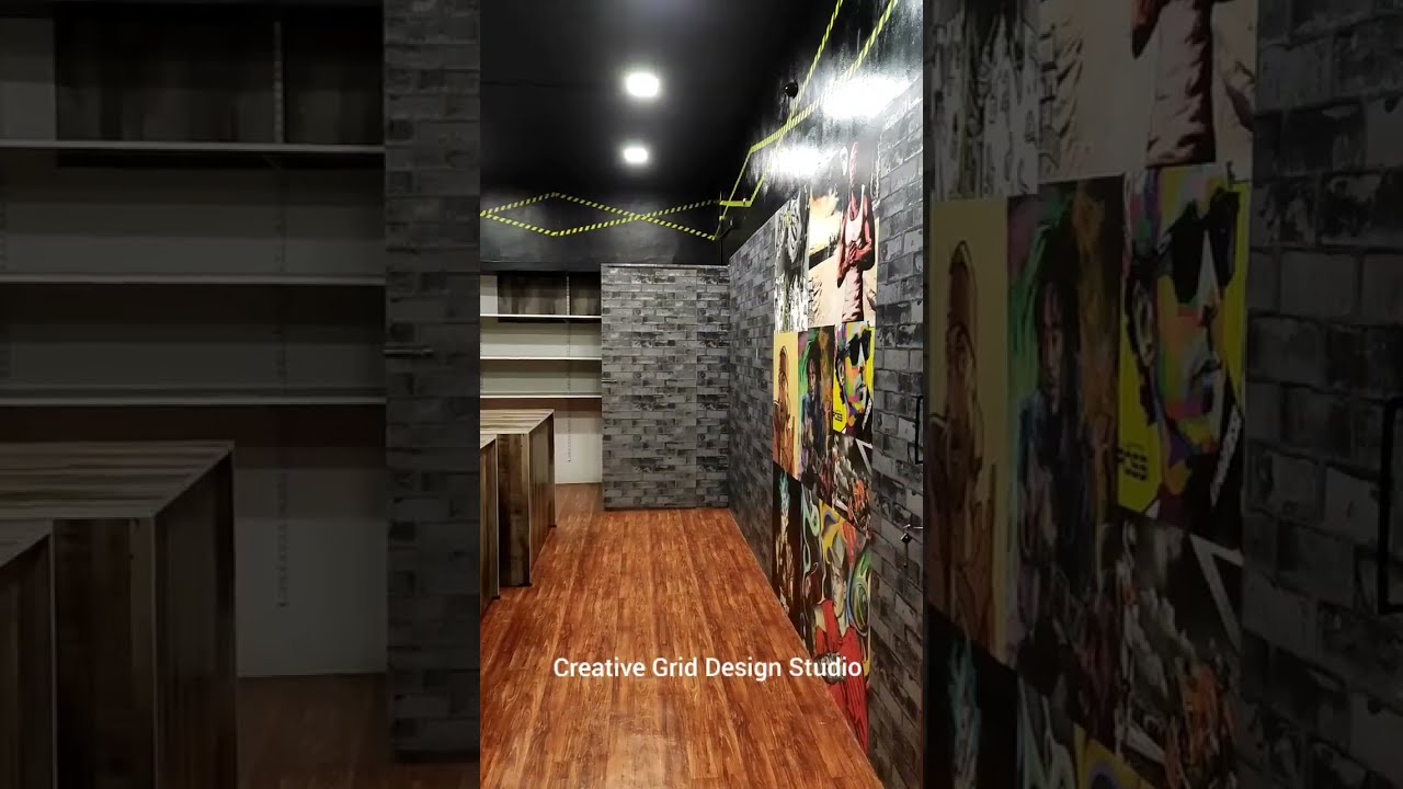 Mens Wear Interior.. #architecture #interiordesign #architects #lighting #woodworking #wallpaper