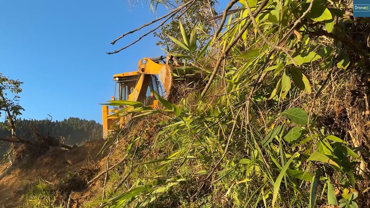 Challenging Mountain Terrain-STEEP Hillside Road Construction as Villagers Spectate