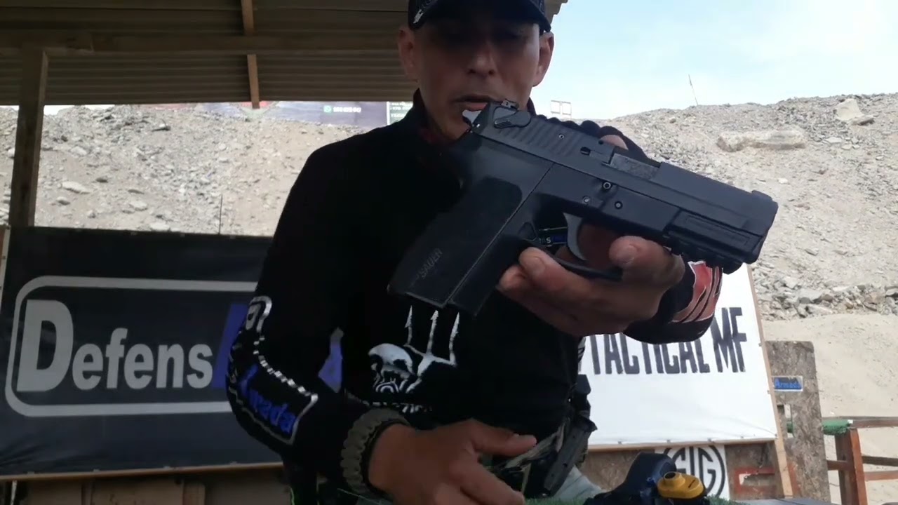 Pistola con seguro o sin seguro.